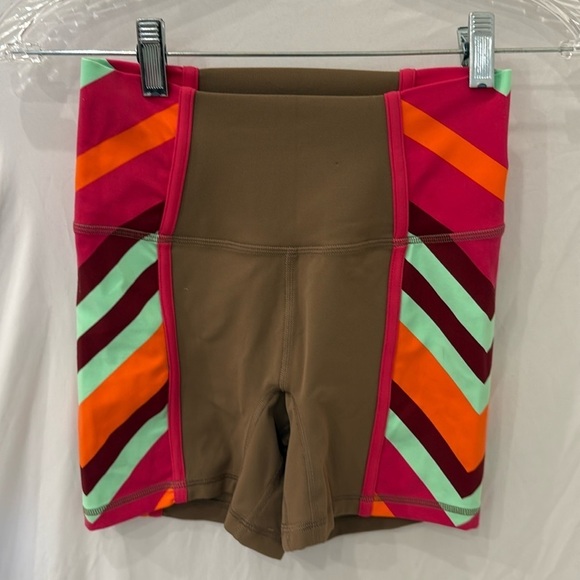 Free People movement Good Karma Bike Shorts In brown and  stripe NWOT - Picture 1 of 3
